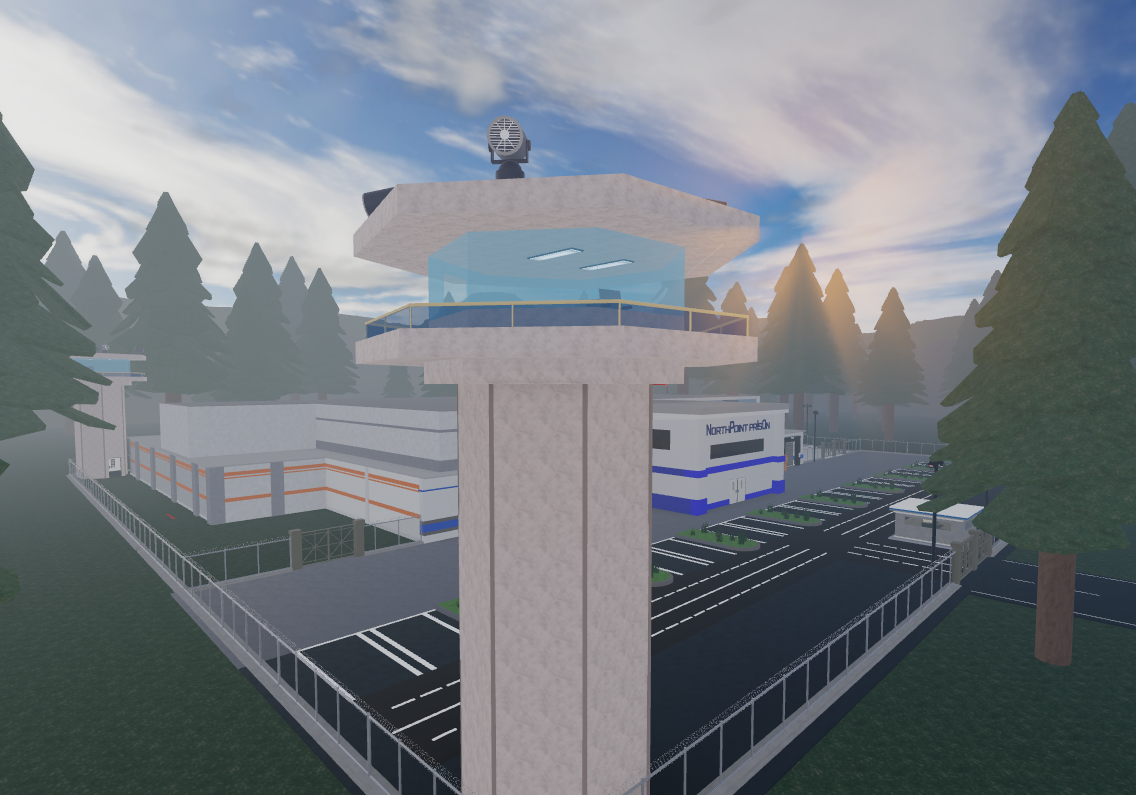 Expansive outdoor facility with a high watchtower